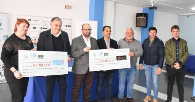 La Comunidad de regantes entrega a las asociaciones AELIP y D´Genes cheque recaudación barra solidaria de la celebración del 40 aniversario del trasvase Tajo-Segura